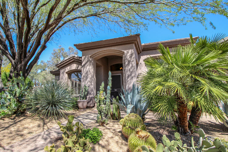 Front outdoor entrance to a beautiful Spanish style home in Phoenix, Arizona